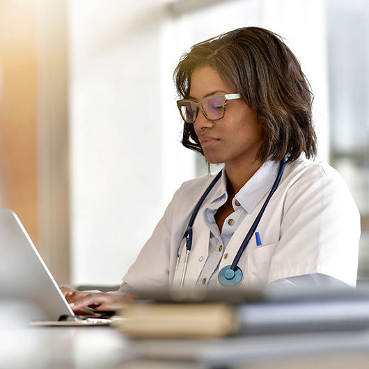 doctor using laptop