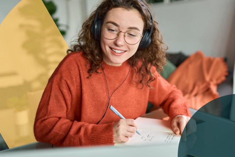 higher education - girl with headset listening to lecture