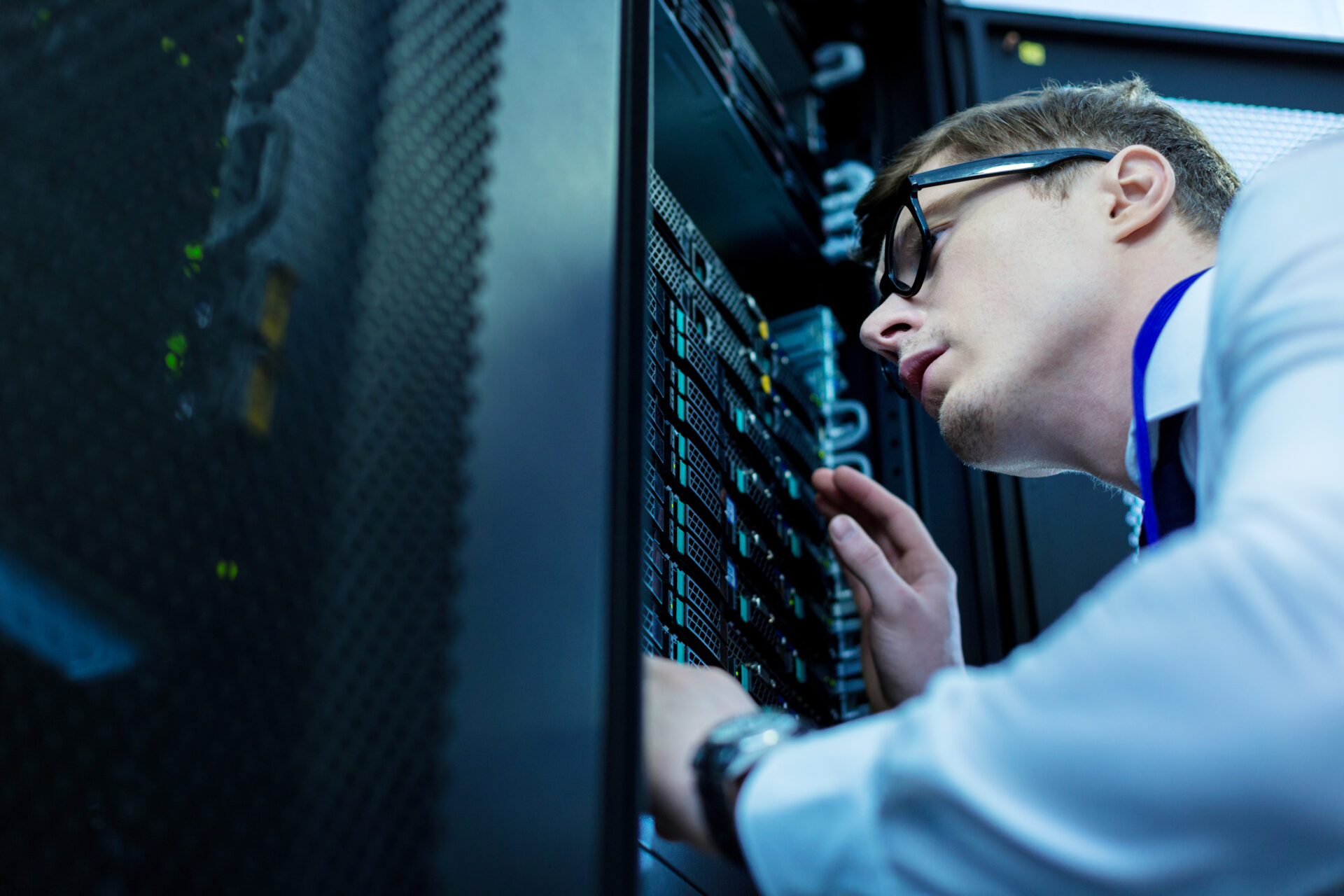 man looking at servers and think about sovereign cloud regulations
